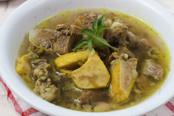 Delicious Indonesian Beef Soup with Yellow Plantain
