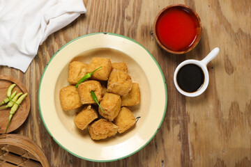 Delicious Fried Tofu Cubes with Chili and Dipping Sauces