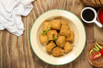 Delicious Fried Tofu Cubes with Chili Garnish