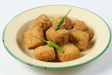 Delicious Fried Tofu Cubes with Chili Garnish