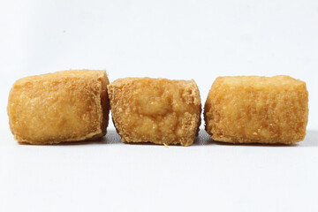 Three Golden Fried Tofu Cubes