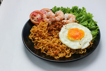 Delicious Indonesian Mie Goreng with Shrimp, Egg, and Tomato