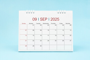 September 2025, Monthly desk calendar for 2025 year on Blue background.