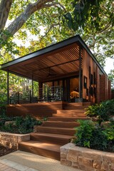 Modern garden house with terrace, steps, under trees. Architecture, real estate