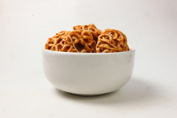 Crispy Spicy Noodle Snacks in a White Bowl