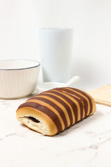 Delicious Chocolate Striped Bread Roll on Marble Surface