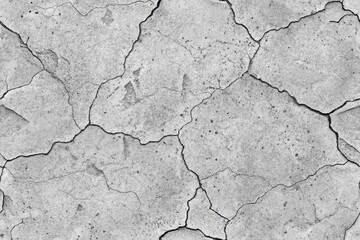 Fototapeta premium Detailed Cracked Concrete Texture Ideal for Backgrounds and Designs in Various Creative Projects