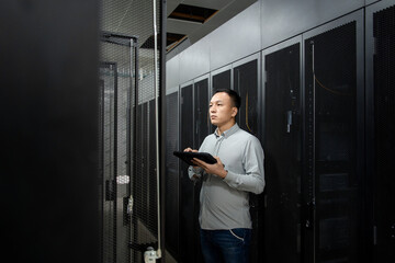 asian male engineer working in database