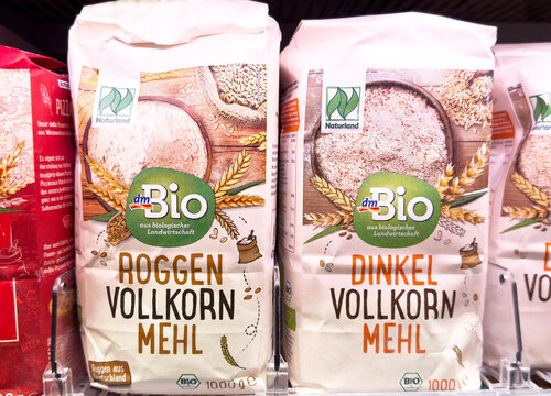 Organic whole grain flour packaging on display in grocery store