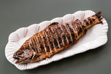 Trout cooked on coals. Natural method of preparation.