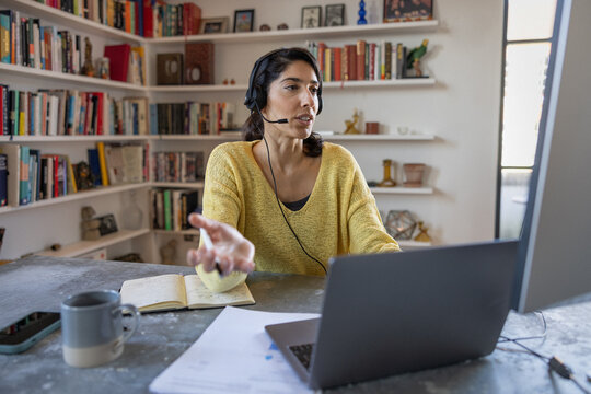 Empowered woman expressing ideas in video session