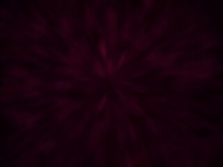 fractal burst background. Decorative bright backdrop in bordeaux and red colors. Festival colorful kaleidoscope. Modern art design of seamless pattern of wrapping paper. Cool creative image