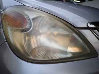 Car headlamp that look dull stock photo. © noer cungkring