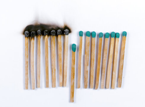 Matches on a sheet of paper. Some matches burned, others survived. Because the match moved down saved the other matches from catching fire. Metaphor. Sometimes, to save the rest, you have to retreat.