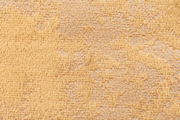 Texture of dense yellow fabric for tailoring. Canvas. Textile. Material. Velour