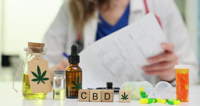 Doctor explains potential benefits of CBD to patient. Physician prescribes CBD and provides detailed instructions for proper dosage and usage