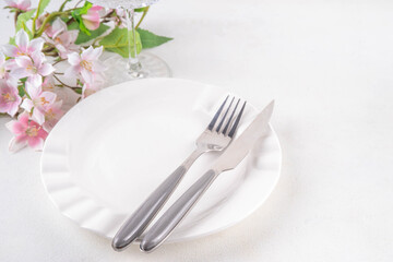 Easter holiday table setting with cutlery