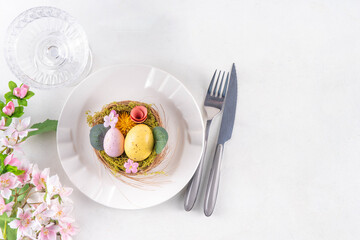 Easter holiday table setting with cutlery
