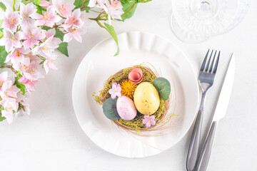 Easter holiday table setting with cutlery