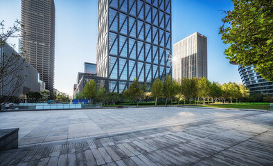 Fototapeta premium Sunny Day at Urban Plaza with Modern Skyscrapers