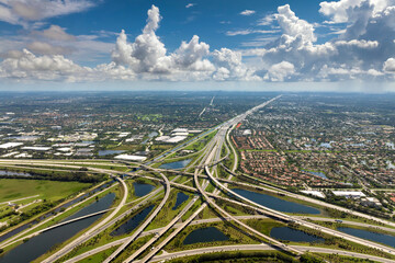 USA car urban transportation infrastructure. American highway junction with fast driving vehicles...
