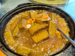 Delicious Hot Tofu Stew with Colorful Vegetables and Aromatic Broth