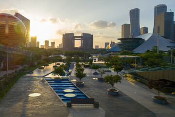 Stunning Urban Sunset Over City Park and Modern Architecture