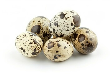 Obraz premium Cluster of speckled quail eggs on white background. Artificial intelligence image