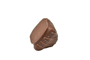 Wafer candy with chocolate filling and covered with chocolate lies on a white background.