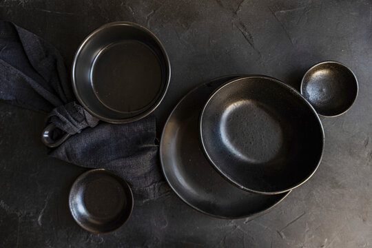 Black crockery on a dark background