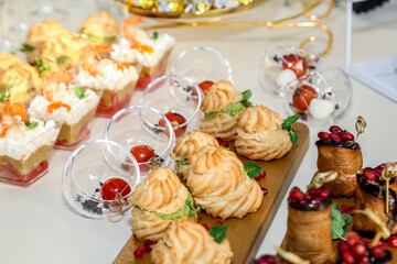 Catering buffet with variety of food snacks and appetizers