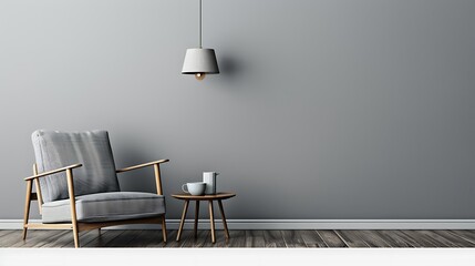 Modern gray interior featuring armchair, side table, hanging lamp, and empty wall background. Minimalist design.