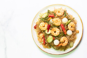 Stir fried stinky vegetables. Stir-fried shrimp noodles asian cuisine gourmet dish indoor setting close-up view flavorful experience.