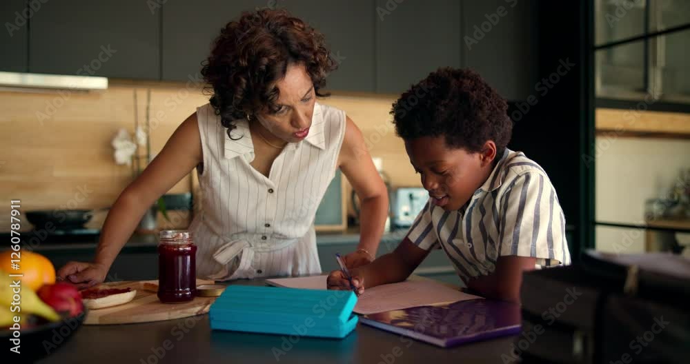 Poster mother, child and writing in kitchen for learning, education and homework assignment at lunch. woman