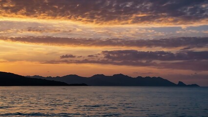 Fototapeta premium Golden Sunset Over Tranquil Sea with Distant Islands ,Breathtaking Landscape