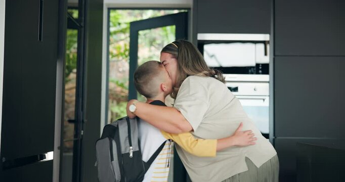 Morning, mother and child with kiss for school, education and ready for learning on first day. Home, mom and boy with backpack for leaving, goodbye embrace and parent for support with hug in kitchen