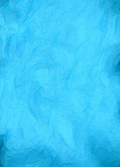 Light blue crumpled tissue paper texture background detail