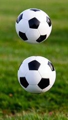 Fototapeta premium A macro shot of blades of grass flying up as a soccer ball is kicked into the air.