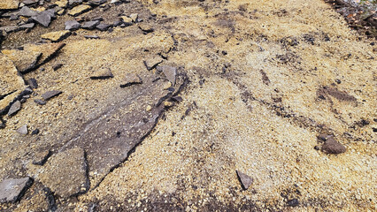 torn asphalt from the road, repair of the asphalt road