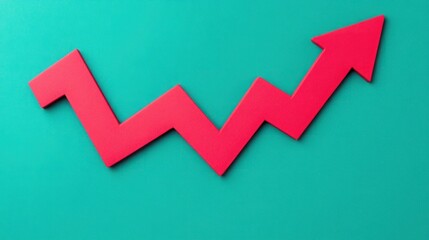 Red arrow graphic representing growth and upward trend on a turquoise background emphasizing business success and economic improvement