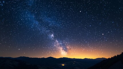 Fototapeta premium A vast expanse of the night sky is filled with countless stars and a radiant moon, casting a gentle glow over the tranquil hills below. The scene resonates with a sense of wonder and spirituality