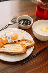 Egg and toast for breakfast.