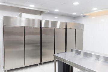 room with refrigeration equipment for cutting meat. place to store meat for a restaurant. interior...