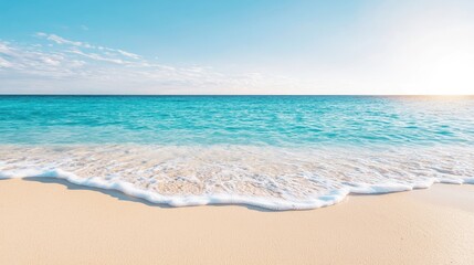 A serene beach scene features gentle waves lapping at golden sand under a bright blue sky.