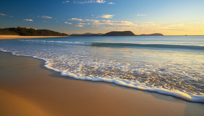 Obraz premium Calm Beach Shoreline with Gentle Waves – Serene Coastal Landscape for Travel and Wellness Marketing