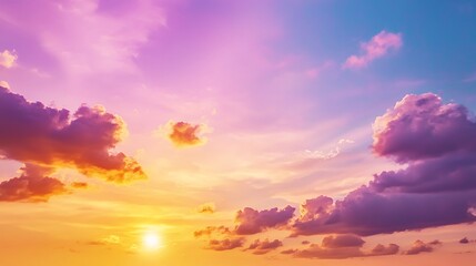 Obraz premium Vibrant Sunset Sky with Pink, Purple, Orange, and Yellow Clouds