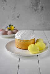 Easter cake and colored eggs.