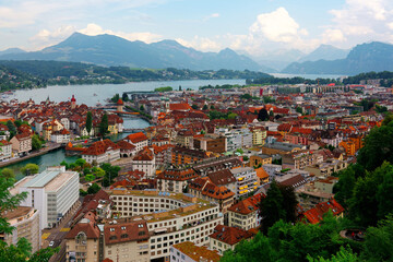 Aerial view of Lucerne City by lakeside, with wooden Chapel Bridge (Kapellbrucke) over Reuss River,...