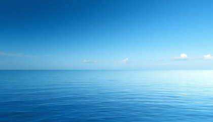Obraz premium A breathtaking view of the calm blue ocean under a clear sky, representing peace and tranquility.