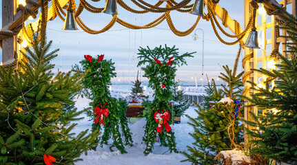Beautiful decorated Christmas Market. Christmas deer made of green fir tree branches	
